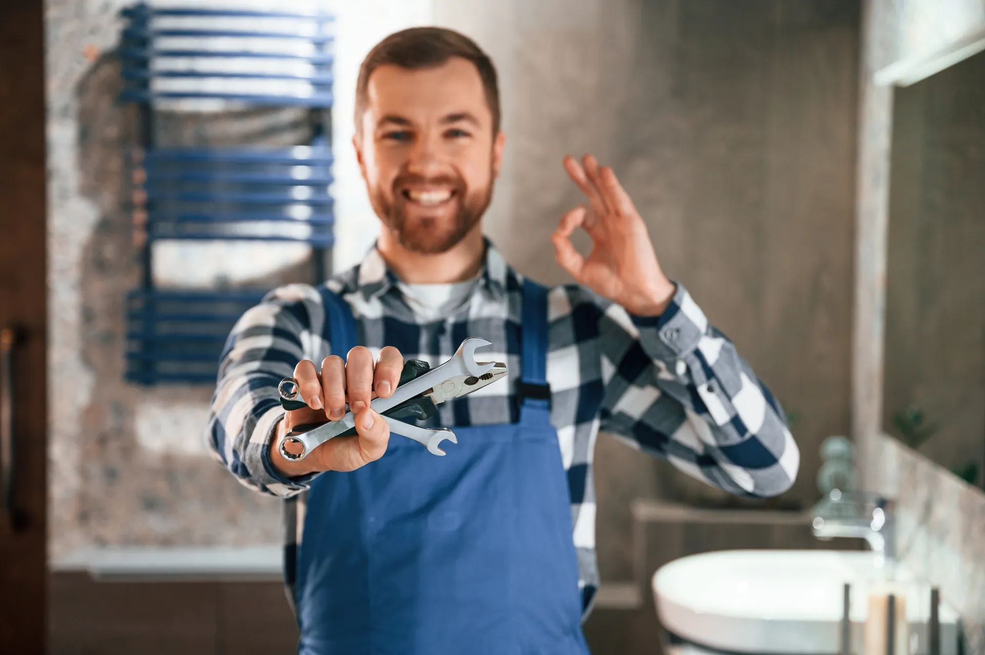 Professional plumber ready for a service call